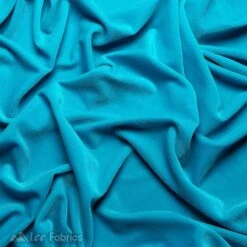 Turquoise Stretch Velvet Fabric Soft And Smooth 11 Turquoise Stretch Velvet Fabric Soft And Smooth -Luxtex Store Turquoise Ice Fabrics Stretch Velvet Fabric Soft and Smooth 3